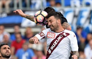 BERGAMO, ITALY - SEPTEMBER 11:  (L-R) Mauricio Pinilla of Atalanta BC competes for the ball with Cesare Bovo of FC Torino during the Serie A match between Atalanta BC and FC Torino at Stadio Atleti Azzurri d'Italia on September 11, 2016 in Bergamo, Italy.  (Photo by Pier Marco Tacca/Getty Images)